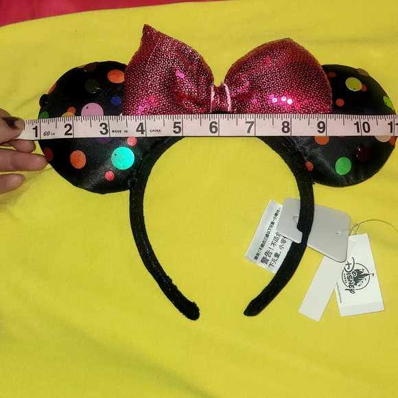 Disneys Minnie Mouse ear headband with a sequined bow and polka dot ears. NWT - Picture 6 of 6